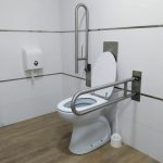 Bathroom fixtures adapted for use by someone with mobility limitations help make the room accessible.