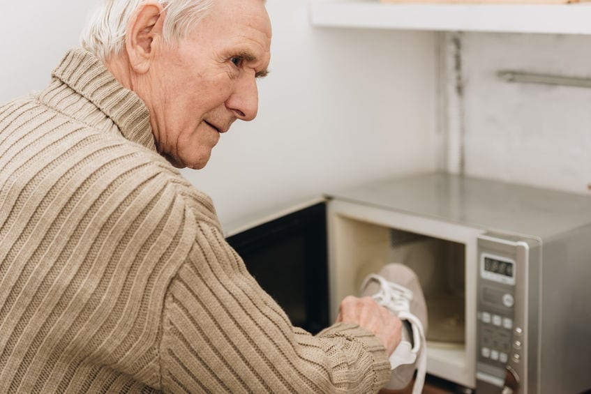 Family members with memory disorders may experience sundowning symptoms and display behaviors such as putting their shoe in microwave oven thinking it's their closet.